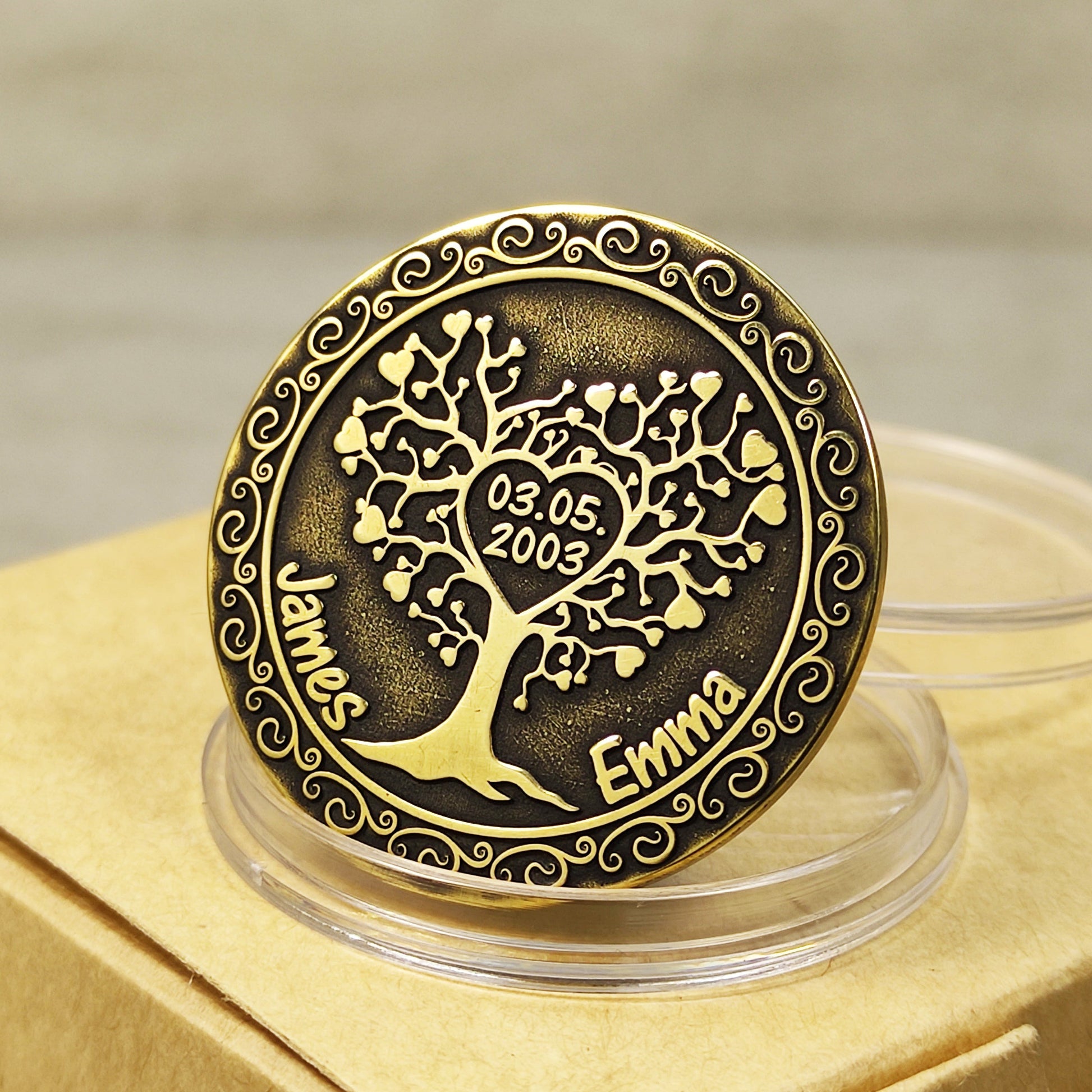 Handmade Tree of Love brass coin with personalized names and date engraving, unique anniversary gift for couple, vintage patina finish.