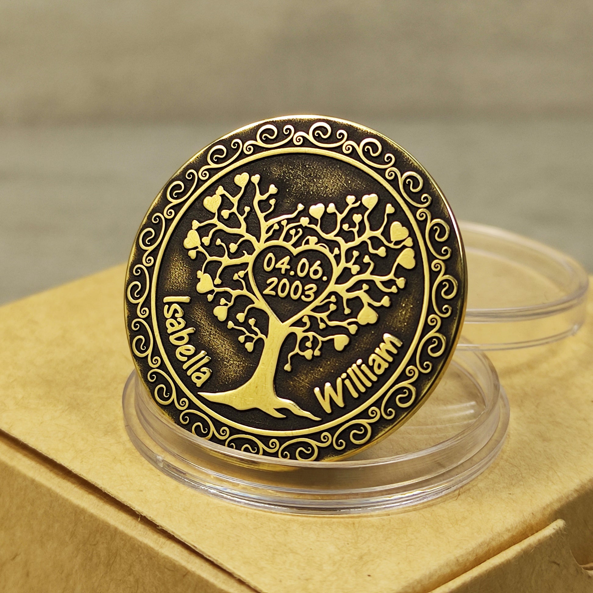 Custom engraved brass coin featuring Tree of Love design, personalized anniversary keepsake for husband or wife, dark aged brass.