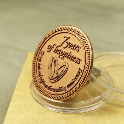 Pure copper 7th anniversary souvenir coin for wife, personalized romantic gift with decorative border and glossy polished surface.