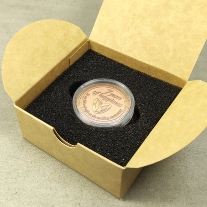 Engraved copper anniversary coin for wife, personalized 7 years of marriage celebration gift inside a craft paper box with foam insert.
