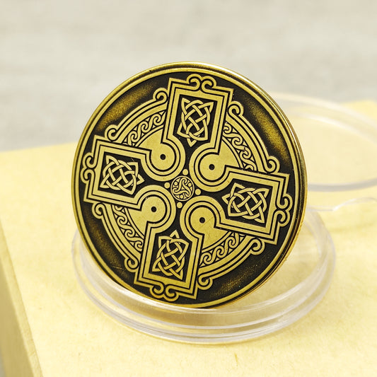 Handmade brass coin with Celtic cross, deep laser engraved infinity knots, 32mm diameter, antique black patina finish.