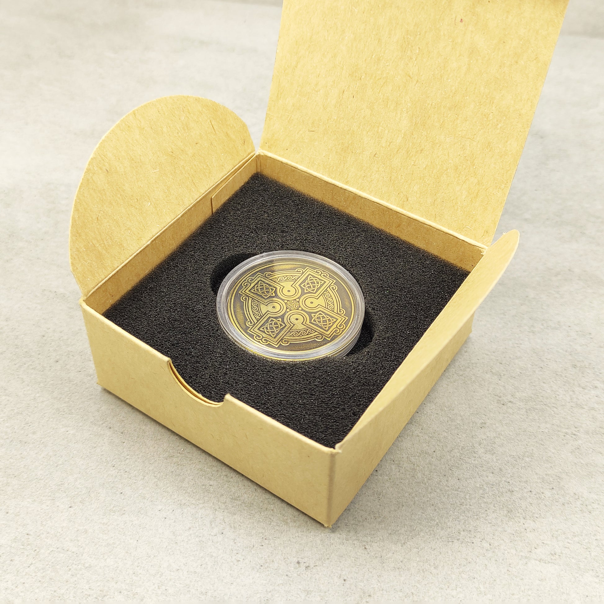 Handcrafted Celtic cross brass coin in a premium gift presentation set, unique personalized token for anniversary or birthday.