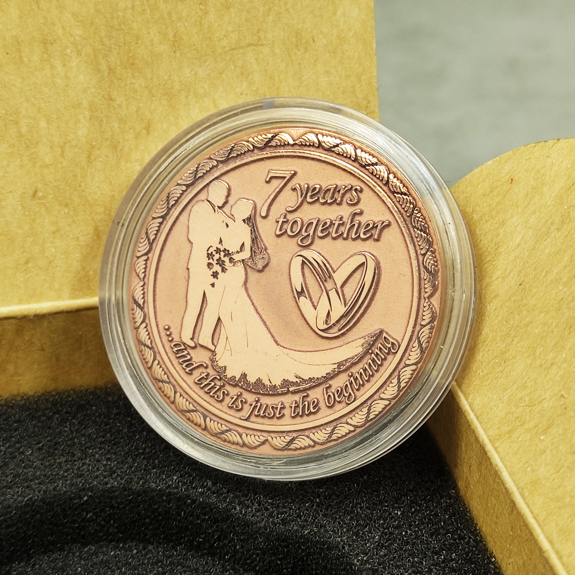 7th wedding anniversary copper token in clear protective acrylic capsule, elegant handmade gift packaging for copper anniversary.