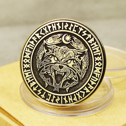 Handcrafted brass Fenrir Wolf coin with Elder Futhark runes, 32mm diameter, deep laser engraving and black patina.