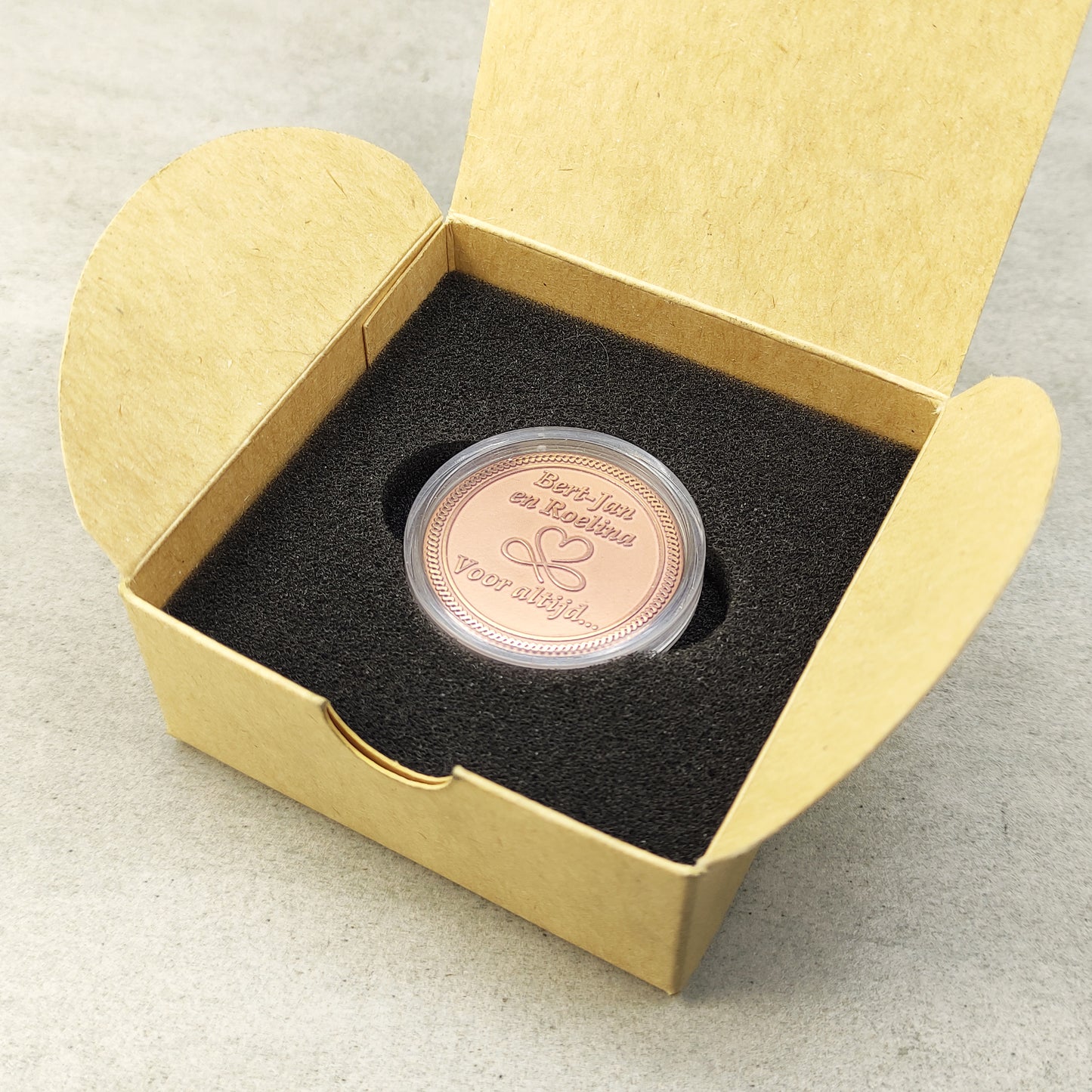 Vertical view of the custom copper gift coin in a premium black insert box, ideal for a 7th wedding anniversary or personalized keepsake.