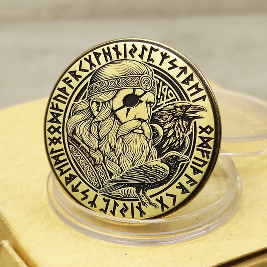 Custom brass Odin coin with Huginn and Muninn ravens, 32mm diameter, deep laser engraving with black patina finish.