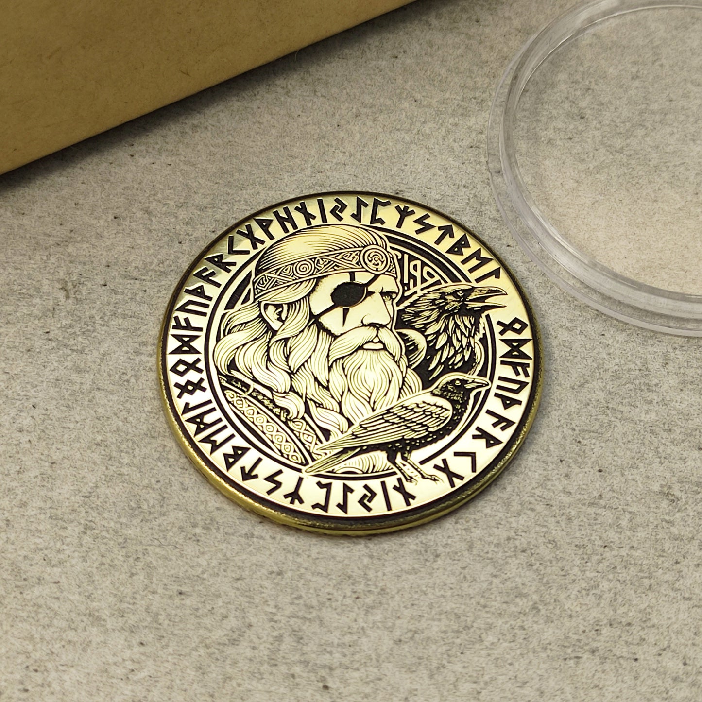 Personalized Norse mythology brass coin featuring Odin and runes, high-contrast antique finish on solid brass metal.