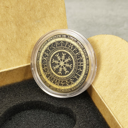 Engraved brass coin in a protective acrylic capsule, placed inside a premium gift box insert.