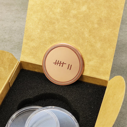 7th wedding anniversary copper coin inside a gift box with black foam insert, premium polished finish, anniversary keepsake.