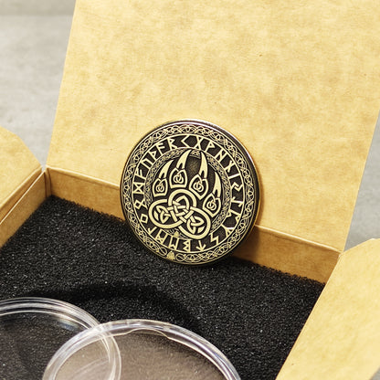 Reverse side of the brass Viking coin with engraved Strength, Courage, and Protection text.