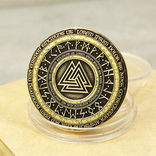 Custom brass coin with Valknut symbol and Elder Futhark runes, 32mm diameter, deep laser engraving with black patina finish.