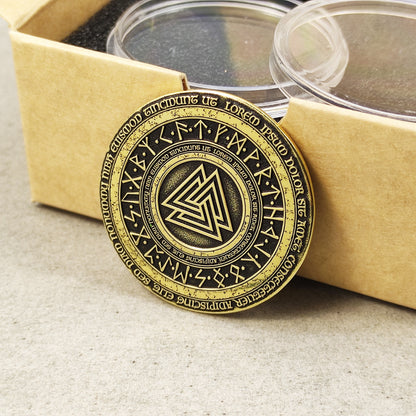 Side perspective of a 2mm thick brass challenge coin, showcasing the metallic texture and precision of the Valknut design.