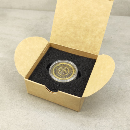 Valknut brass coin gift set in a craft paper box with foam insert, premium packaging for a personalized Norse mythology gift.