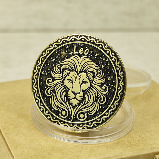 Close-up of Leo zodiac brass medal with deep laser engraving of a lion head, features antique dark patina finish and decorative celestial border in a protective capsule.