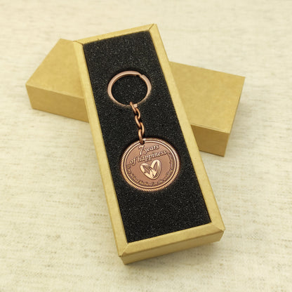 Personalized 7th anniversary copper keychain for husband inside a premium gift box, ready to gift handmade souvenir with custom engraving.