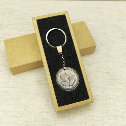 Stainless steel 11th anniversary coin keychain presented in a premium black insert gift box, ready-to-gift personalized wedding anniversary souvenir.