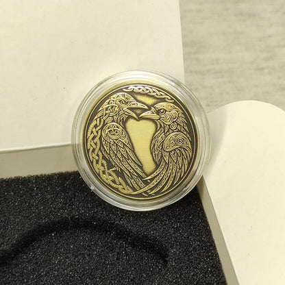 Handcrafted Viking ravens brass coin in a protective capsule and gift box, unique personalized Norse talisman for protection.