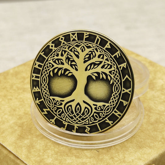 Handcrafted brass coin with Tree of Life Yggdrasil engraving, 32mm diameter, deep black patina and Nordic rune circle.
