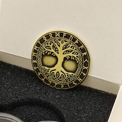 Perspective view of a 2mm thick brass challenge coin, showcasing the metallic luster and high-contrast Viking symbolism.