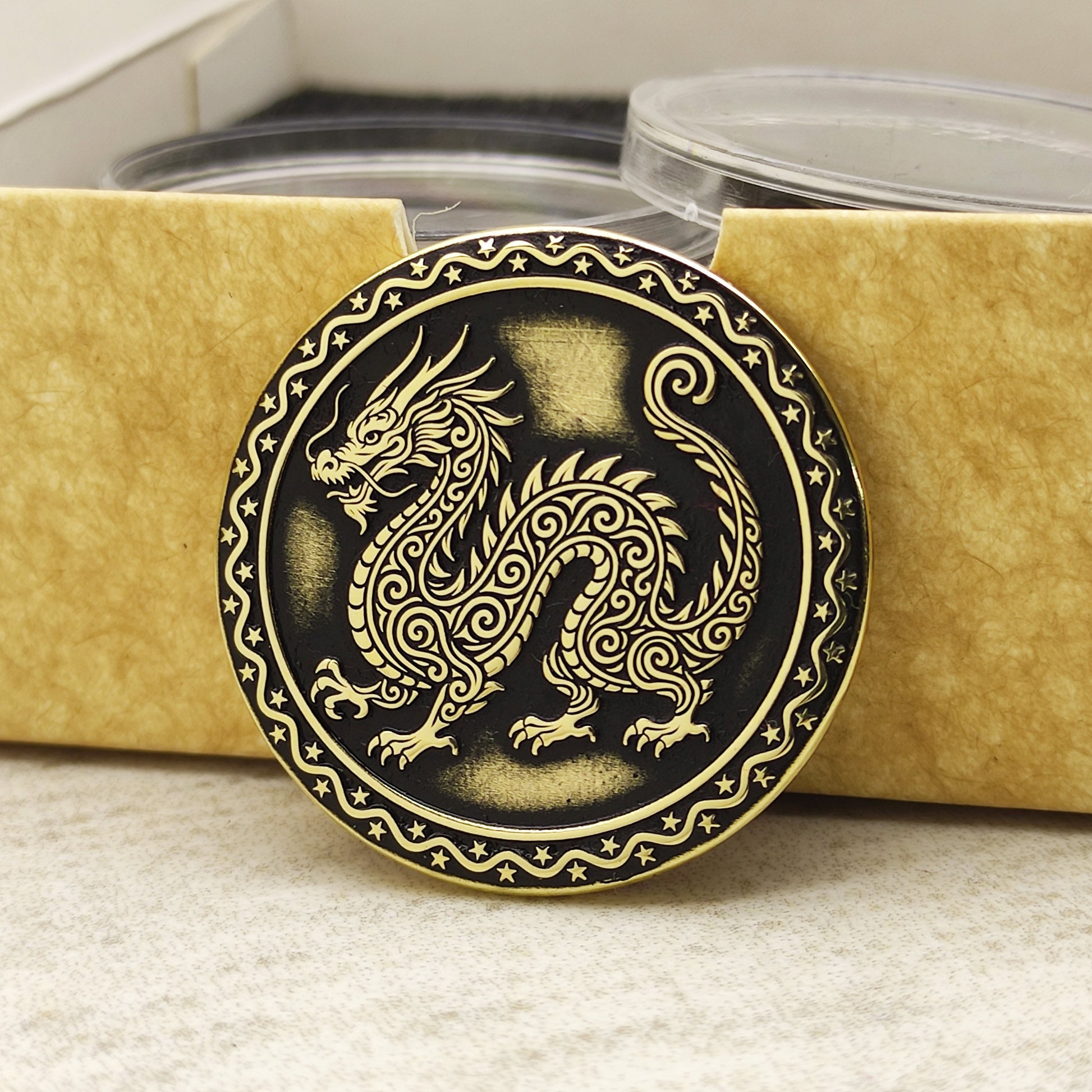 Brass Year of the Dragon zodiac coin in a protective acrylic capsule and eco-friendly craft gift box, highlighting the polished brass quality.