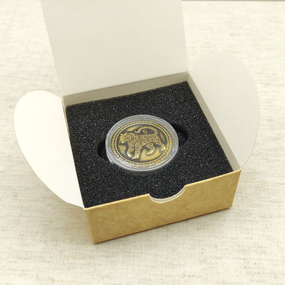 Ready-to-gift personalized brass zodiac medal, handmade Chinese Year of the Tiger coin in a square craft box with black foam insert.
