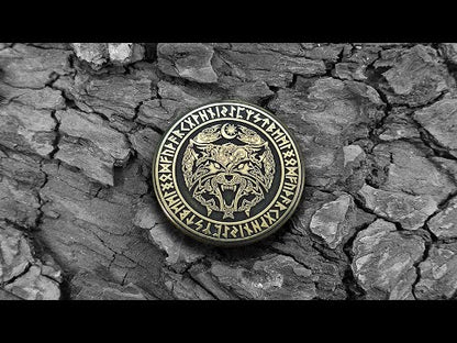 Norse mythology Fenrir Wolf brass amulet, detailed runic circle engraving with antique finish on a stone background.