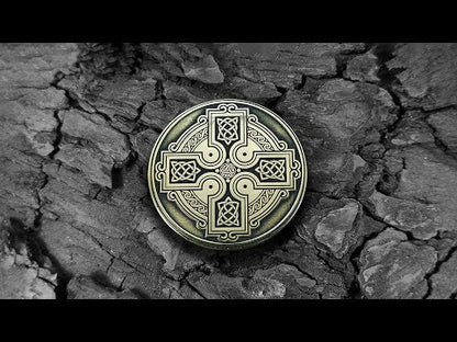 Video showcasing handcrafted Celtic cross brass token, highlighting 3D relief engraving and metallic golden luster.