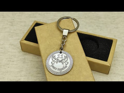 11 years together steel anniversary gift keychain with custom engraving and metallic finish.