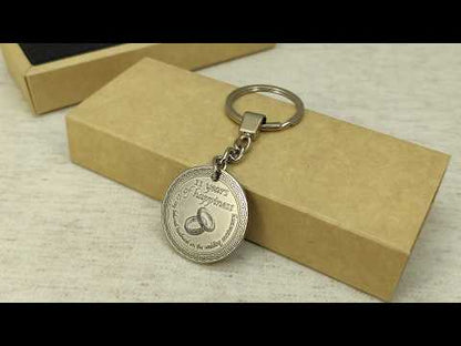 Personalized brass coin keychain for 11 year anniversary, showcasing the durable metal surface with antique patina finish, handcrafted anniversary gift for him.