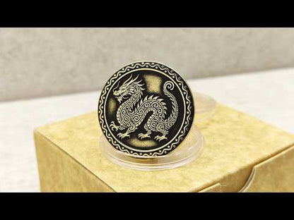Video showcase of a personalized brass zodiac coin Year of the Dragon, highlighting the metallic gold-tone texture and high-contrast professional patina.